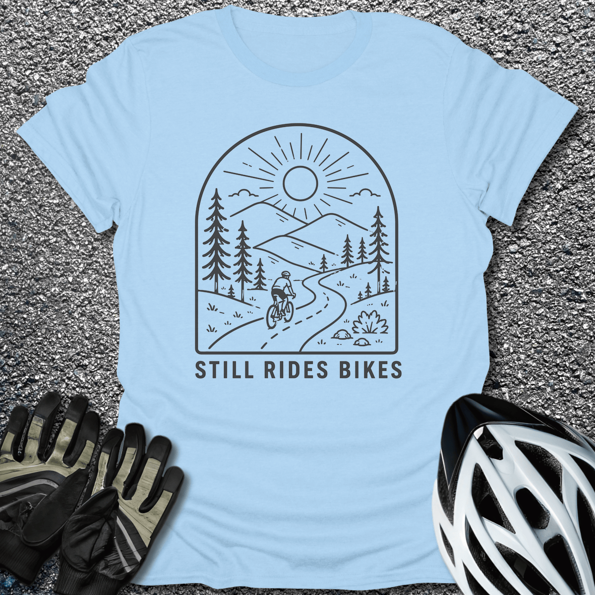 Still Rides Bikes T-Shirt in Light Blue / S from CycleTees