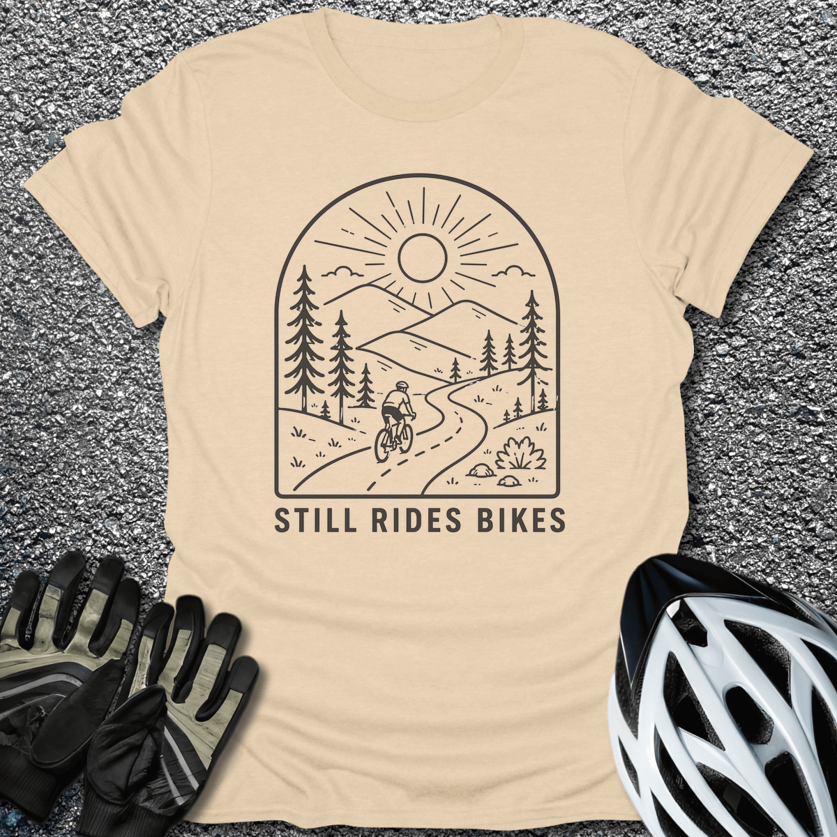 Still Rides Bikes T-Shirt in Sand / S from CycleTees